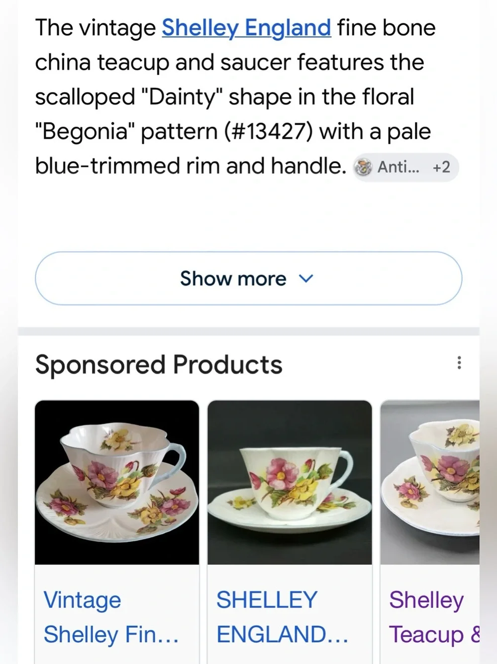 Floral Porcelain Teacup and Saucer in White with Blue Trim